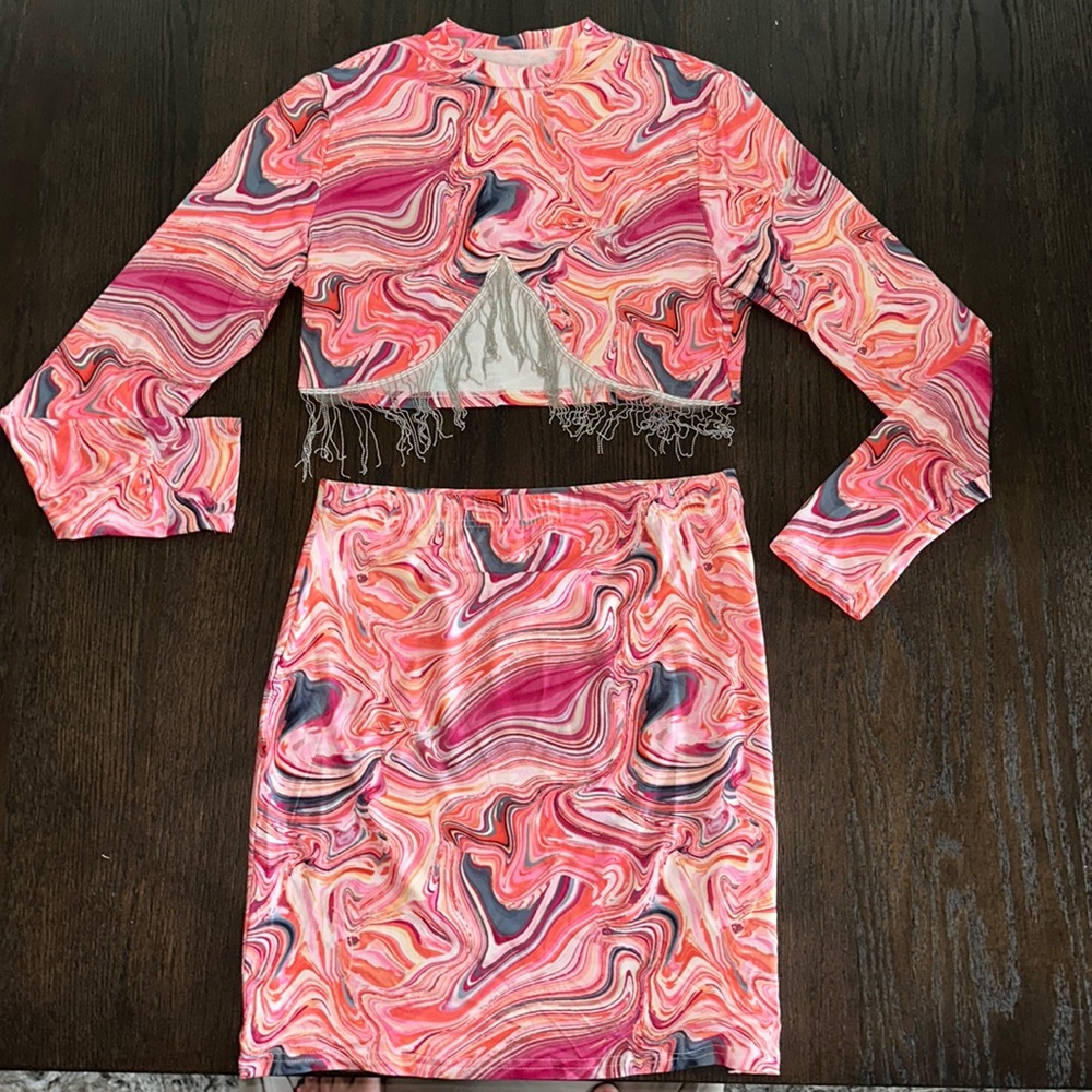 Women’s long sleeve shirt and matching skirt set.
